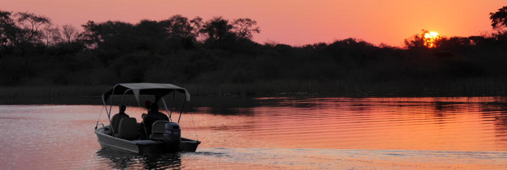 Sonnenuntergang See Boot Afrika